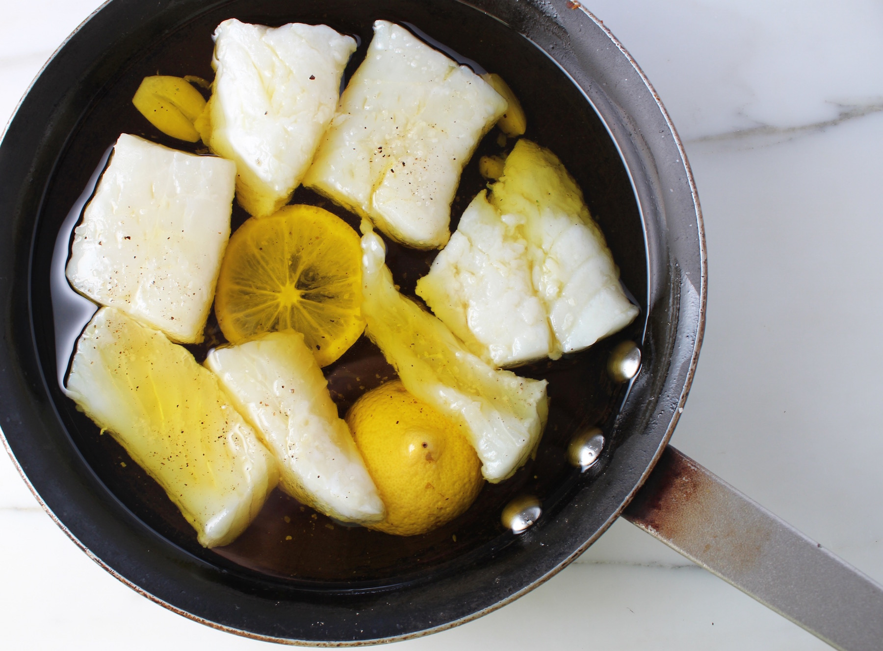 Poached Cod in Olive Oil
