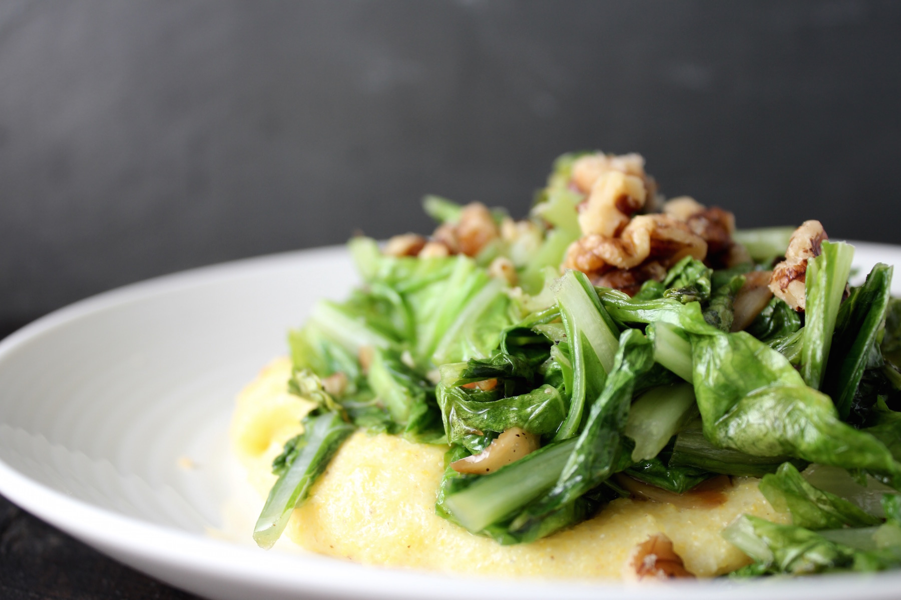 Komatsuna with polenta and walnuts